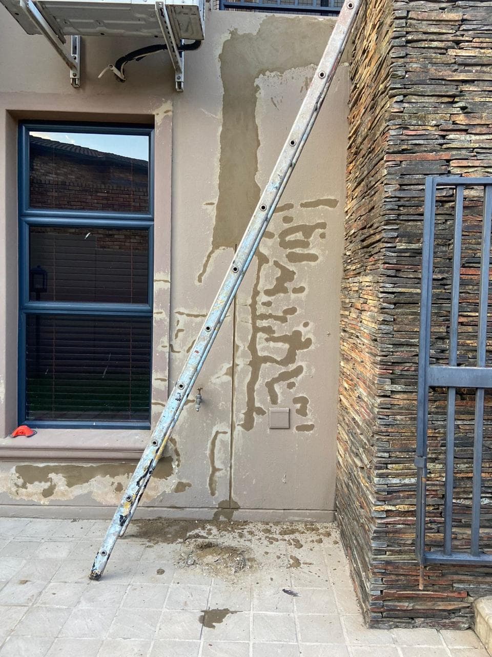 Exterior plaster repairs on a Johannesburg home