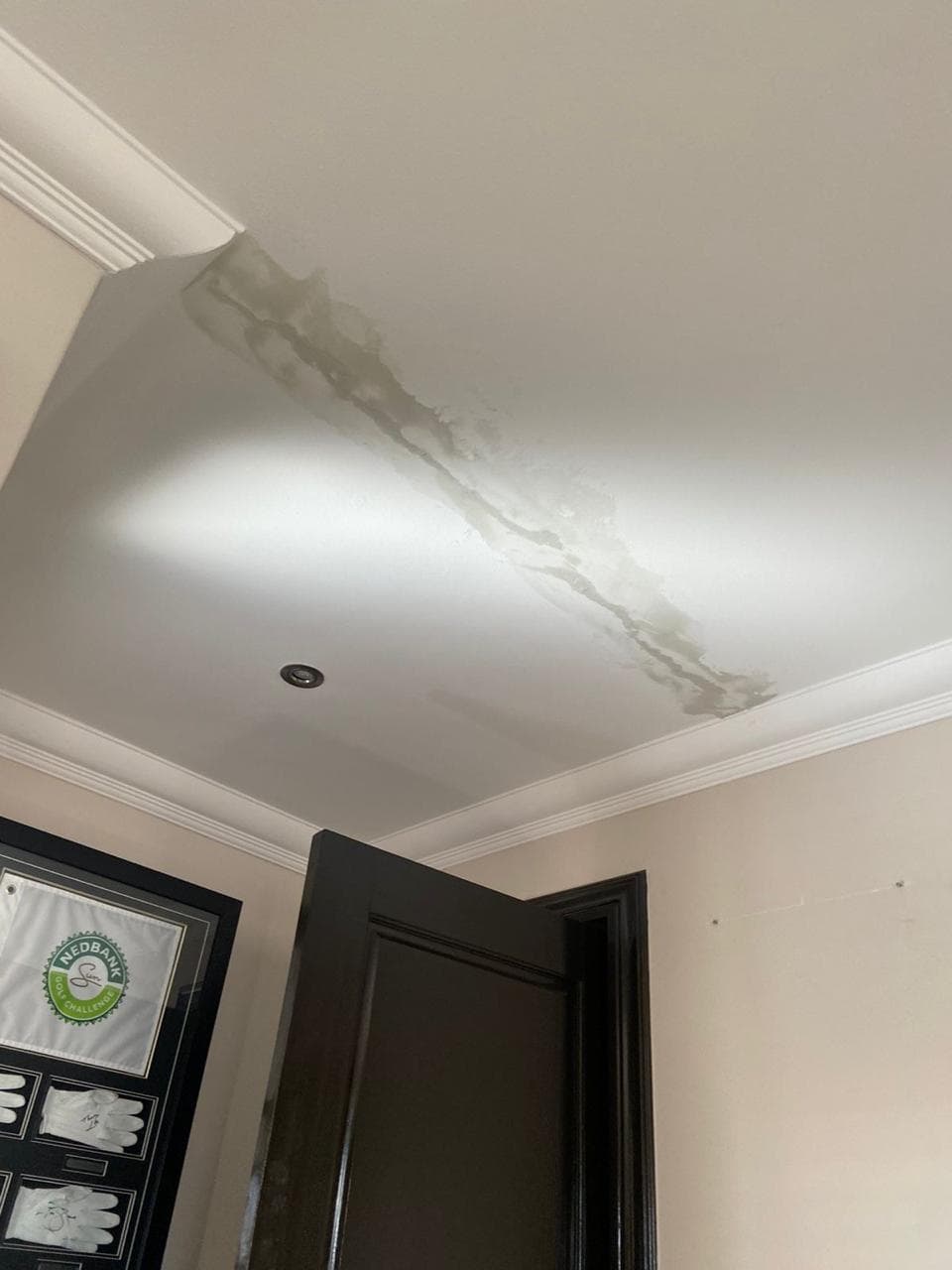 Ceiling water stain traced before repair
