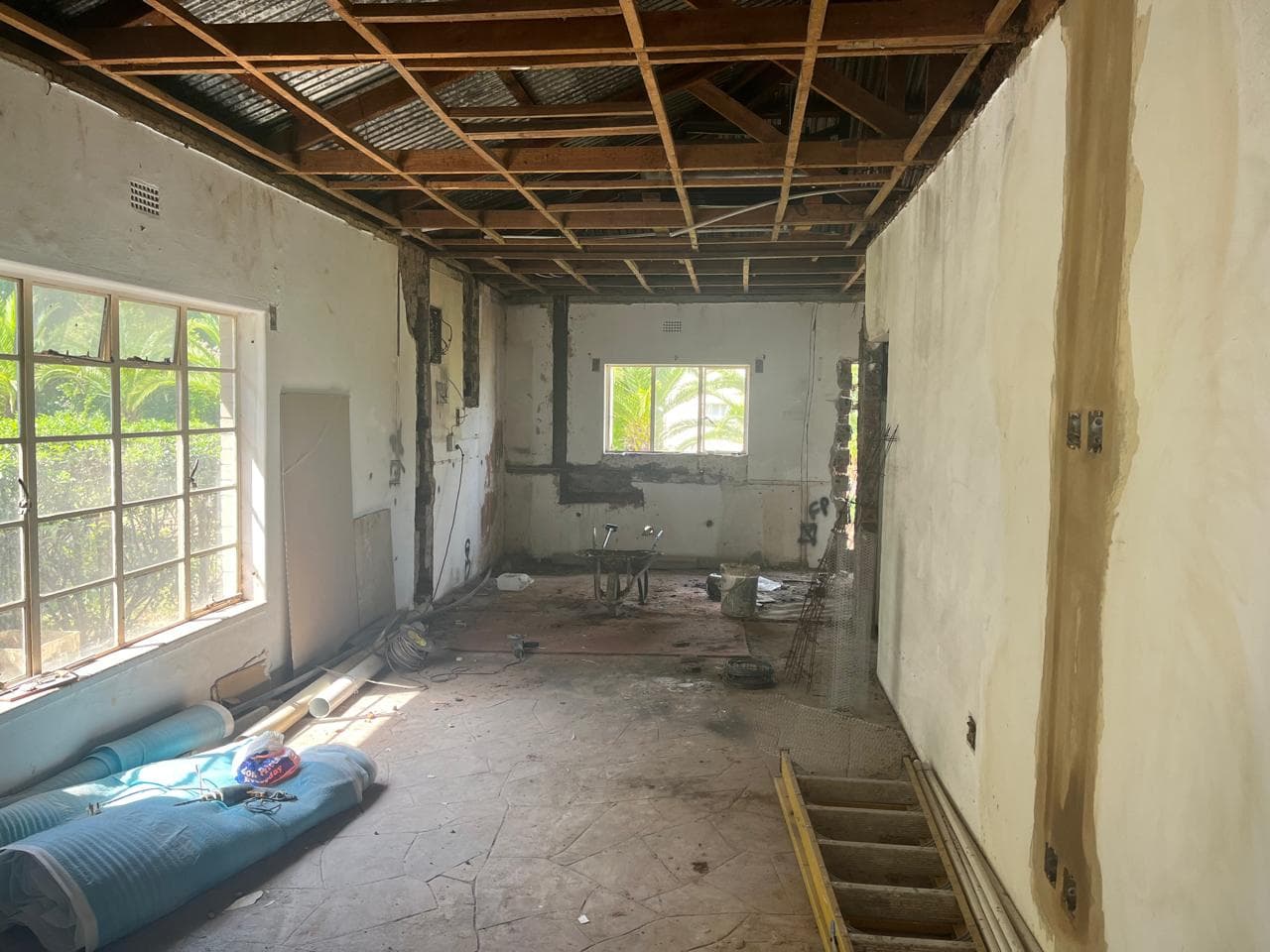Interior room stripped back to trusses during renovation