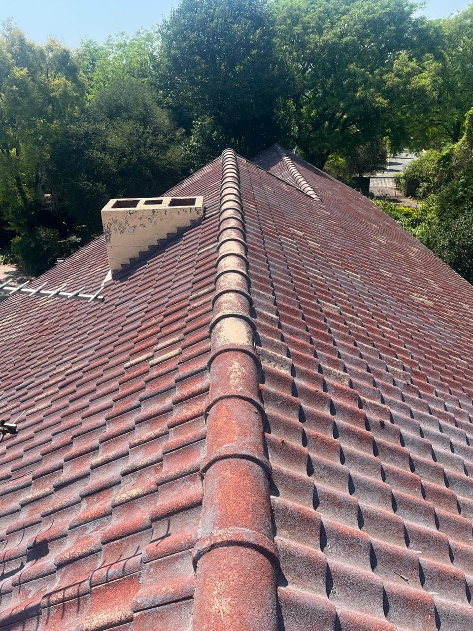 Tiled roof inspected from the ridge line