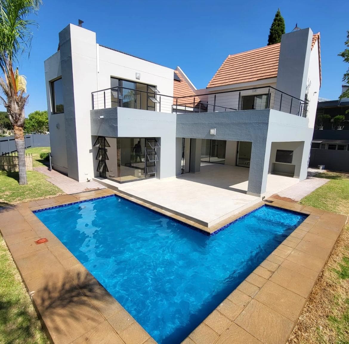 Johannesburg home with a renovated pool and clean exterior finish